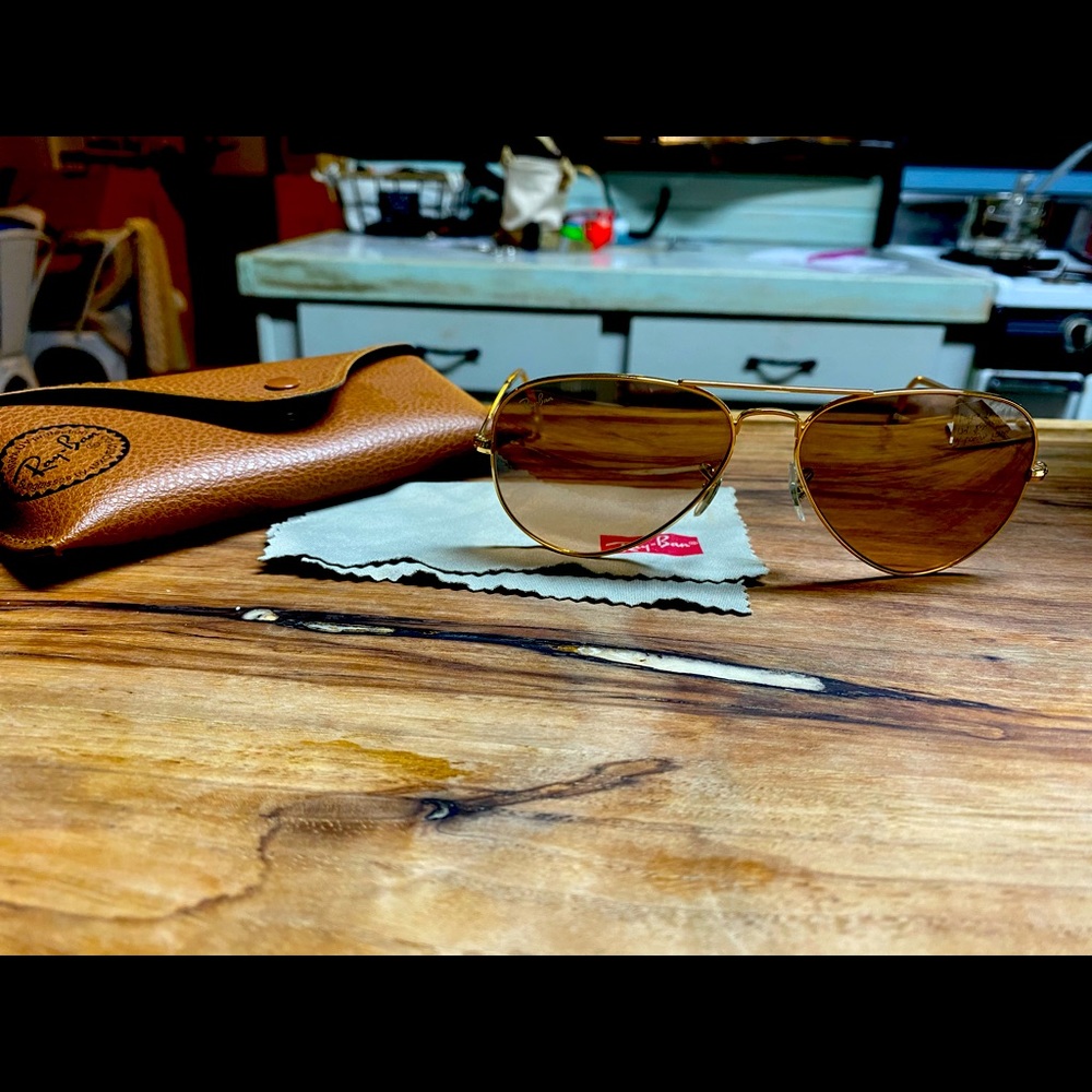 Ray Ban Aviators rose gold lenses gold hardware.
